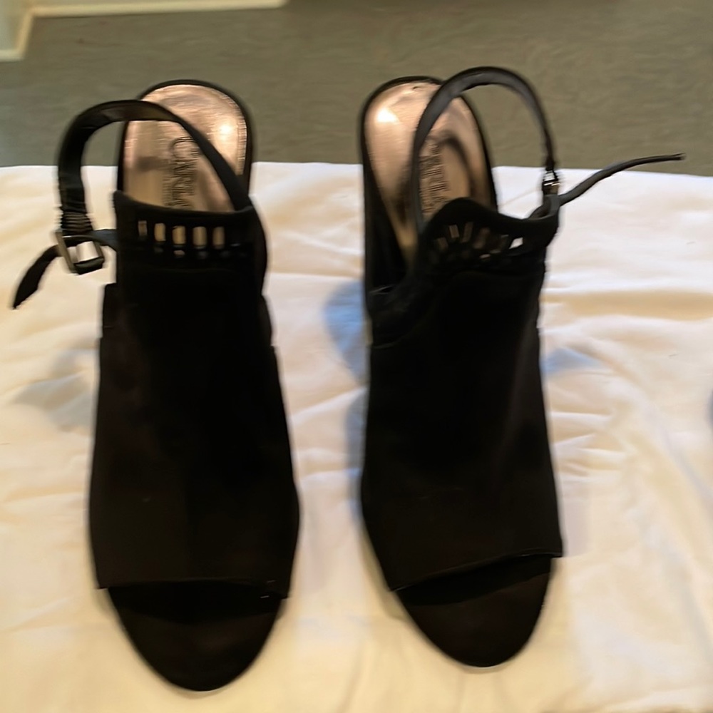 Black sandal heels, Carlos Santana